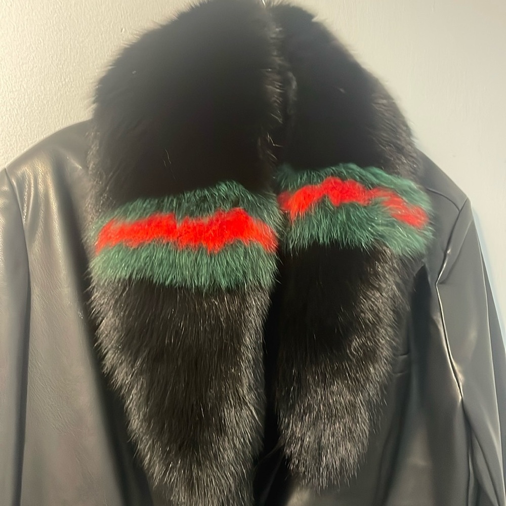 Fur detachable scarf. It’s new without tags.